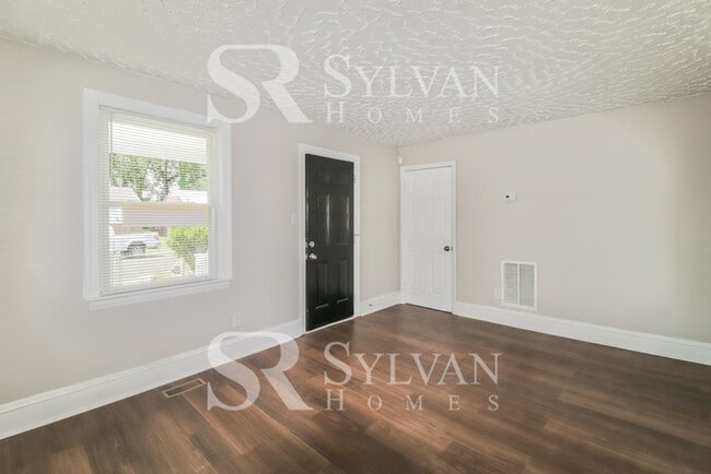 Building Photo - Proper Design. Smartly Priced. Ready for Move-In!