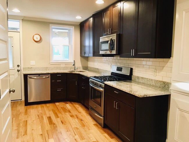 Building Photo - Charming 2 Bedroom/3 Bathroom Townhome w/ Den and In-Unit Laundry in Locust Point, MD! - Parking ...