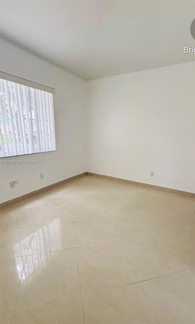 Building Photo - 10420 SW 24th Ct