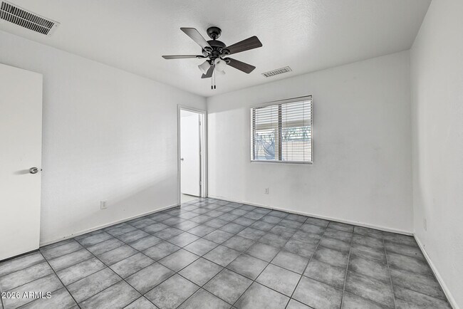 Building Photo - 3015 N 84th Dr