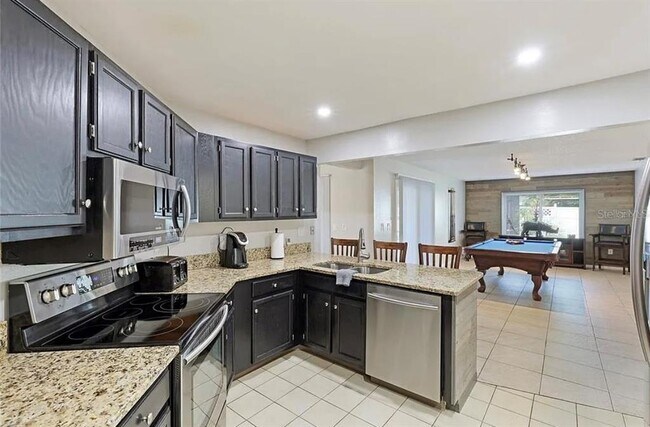 Building Photo - 7316 Caladesia Dr