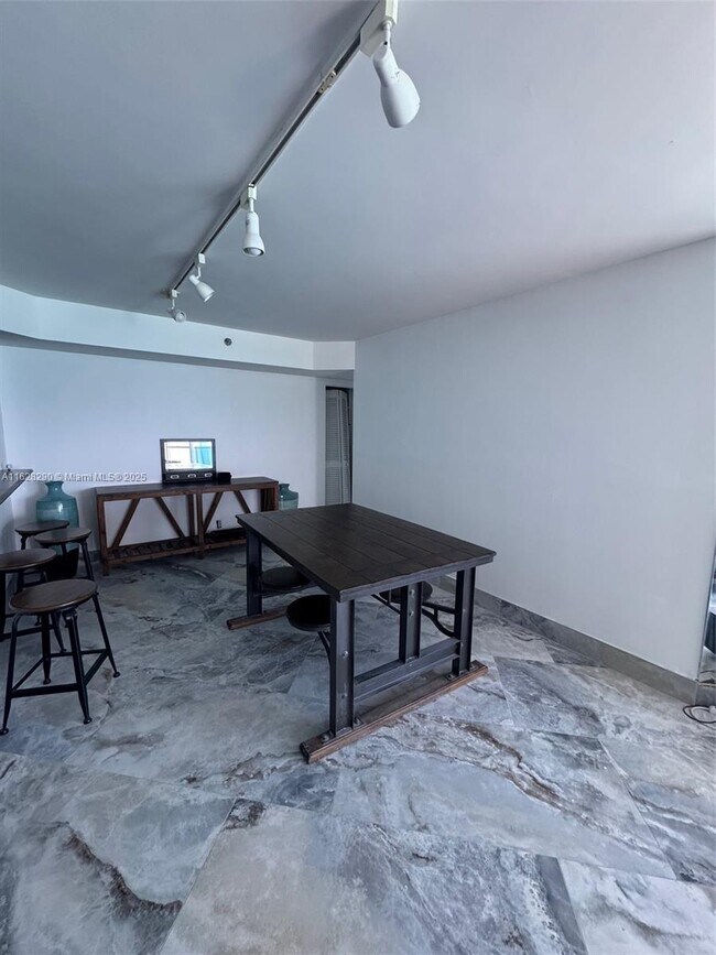 Building Photo - 6767 Collins Ave