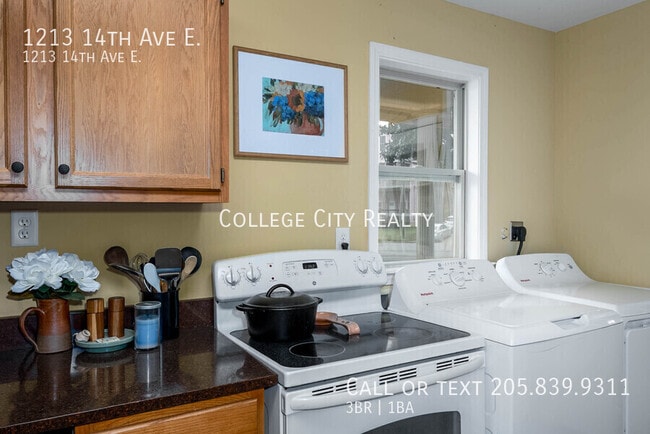 Building Photo - 1213 14th E Ave