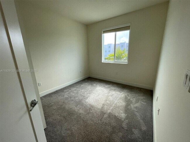 Building Photo - 6416 NW 102nd Ct