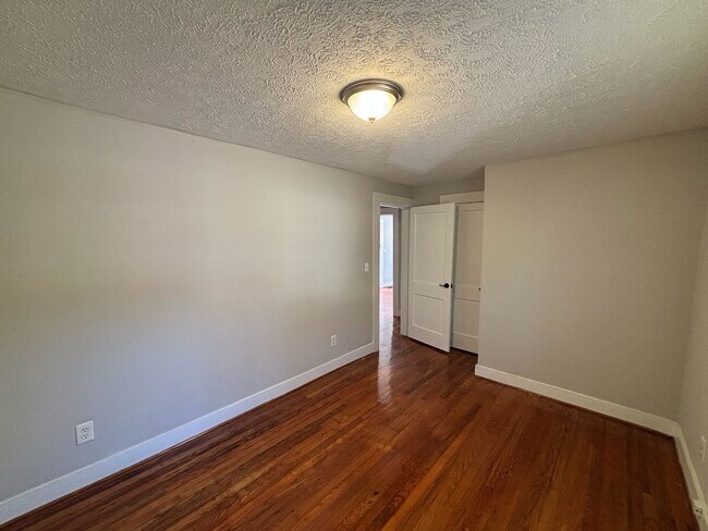 Building Photo - Where Style Meets Serenity — A Spacious, Charming Home in an Unbeatable Central Location