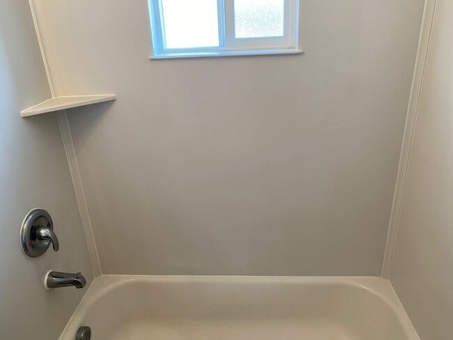 Building Photo - One story one bedroom Duplex Apartment, All Tile Floors!!! All Appliances!! Big back yard!! Recen...