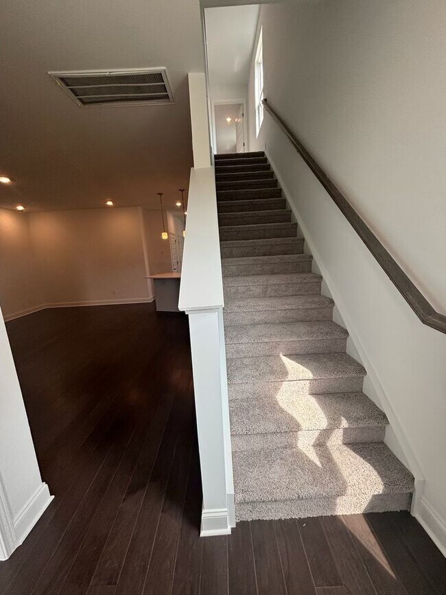 Building Photo - **BE THE LUCKY ONE TO LIVE IN THIS 2024-BUILT END-UNIT TOWNHOME IN A RESORT-STYLE COMMUNITY**