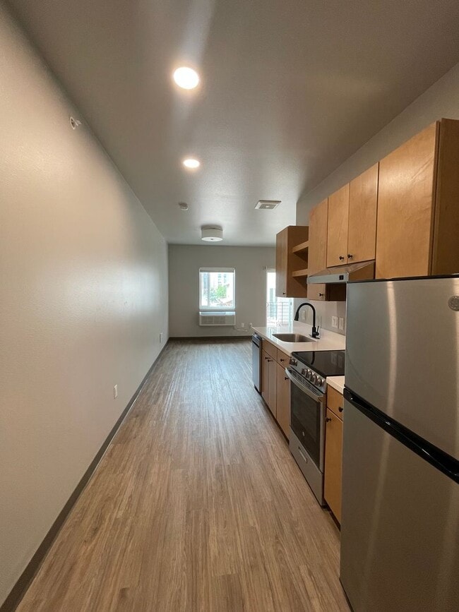 Building Photo - Beautiful, Cozy, Brand New Studio near CSU