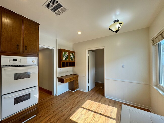 Building Photo - Charming 4-Bedroom Home on a Quiet Tree-Li...