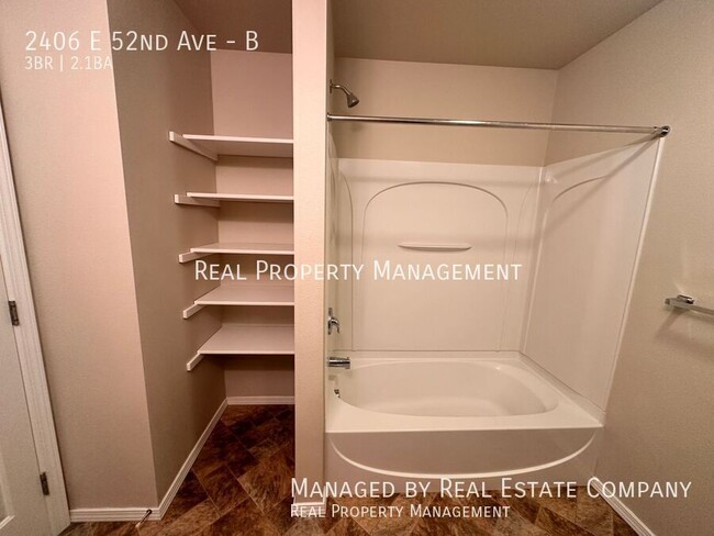 Building Photo - 2406 E 52nd Ave