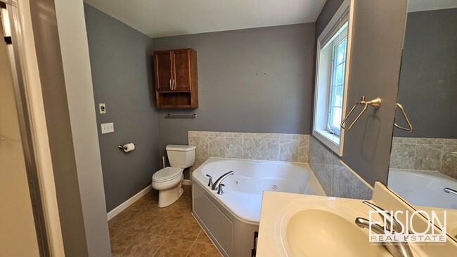 Building Photo - FREE July Rent for this Quiet, Four Bedroo...