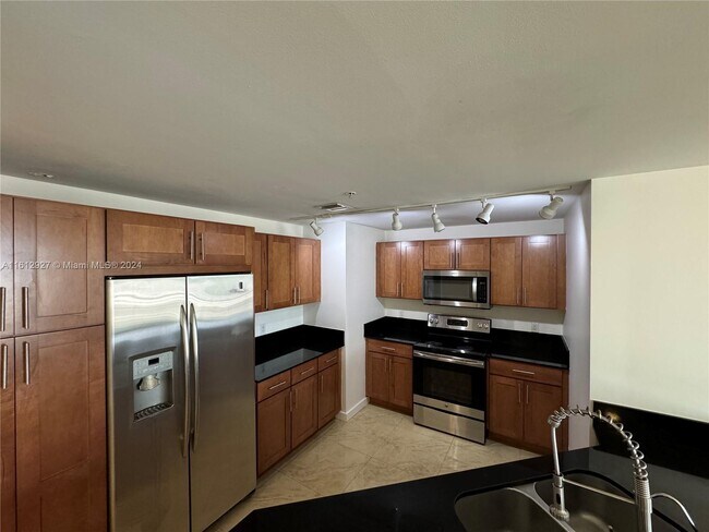 Building Photo - 8390 SW 72nd Ave