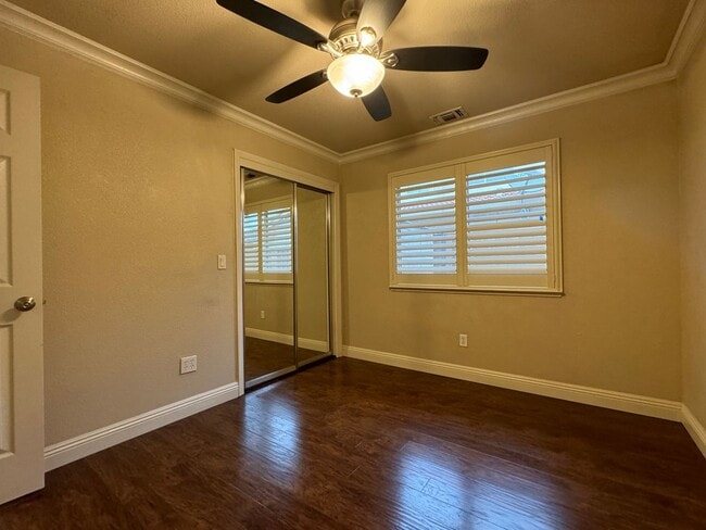 Building Photo - Immaculate home with pool & hardwood floors!