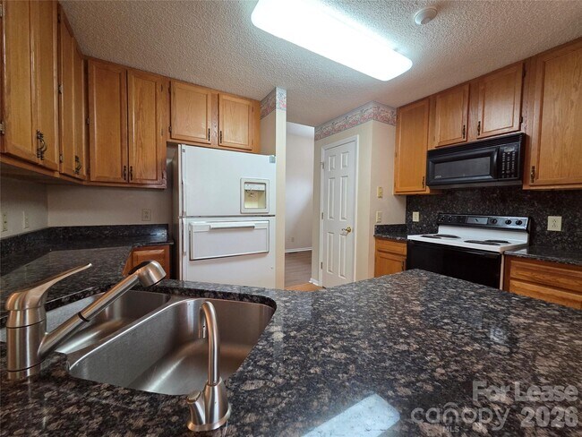 Building Photo - 1319 Mistletoe Ridge Pl NW