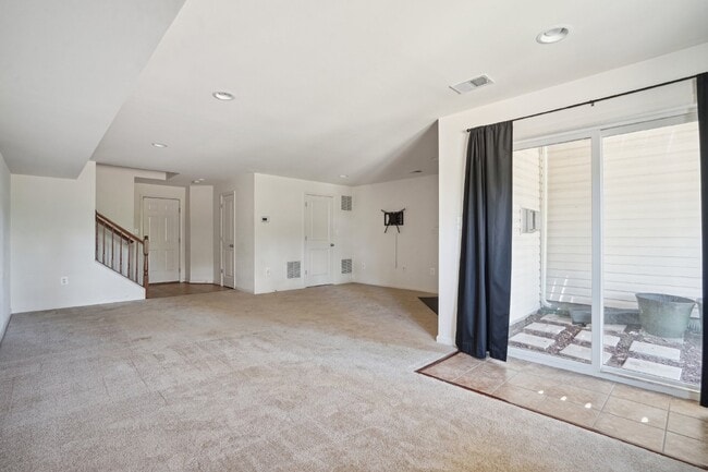 Building Photo - This beautiful townhome spans three finished levels and over 2800 square feet.