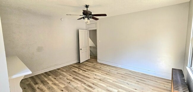 Building Photo - Spacious 4-Bedroom Home with 3-Car Garage, Deck & More!!