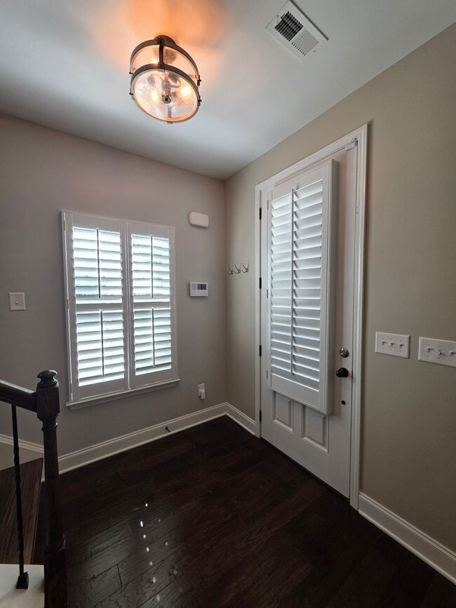 Building Photo - For Lease  End-Unit 3-Bedroom Townhome wit...