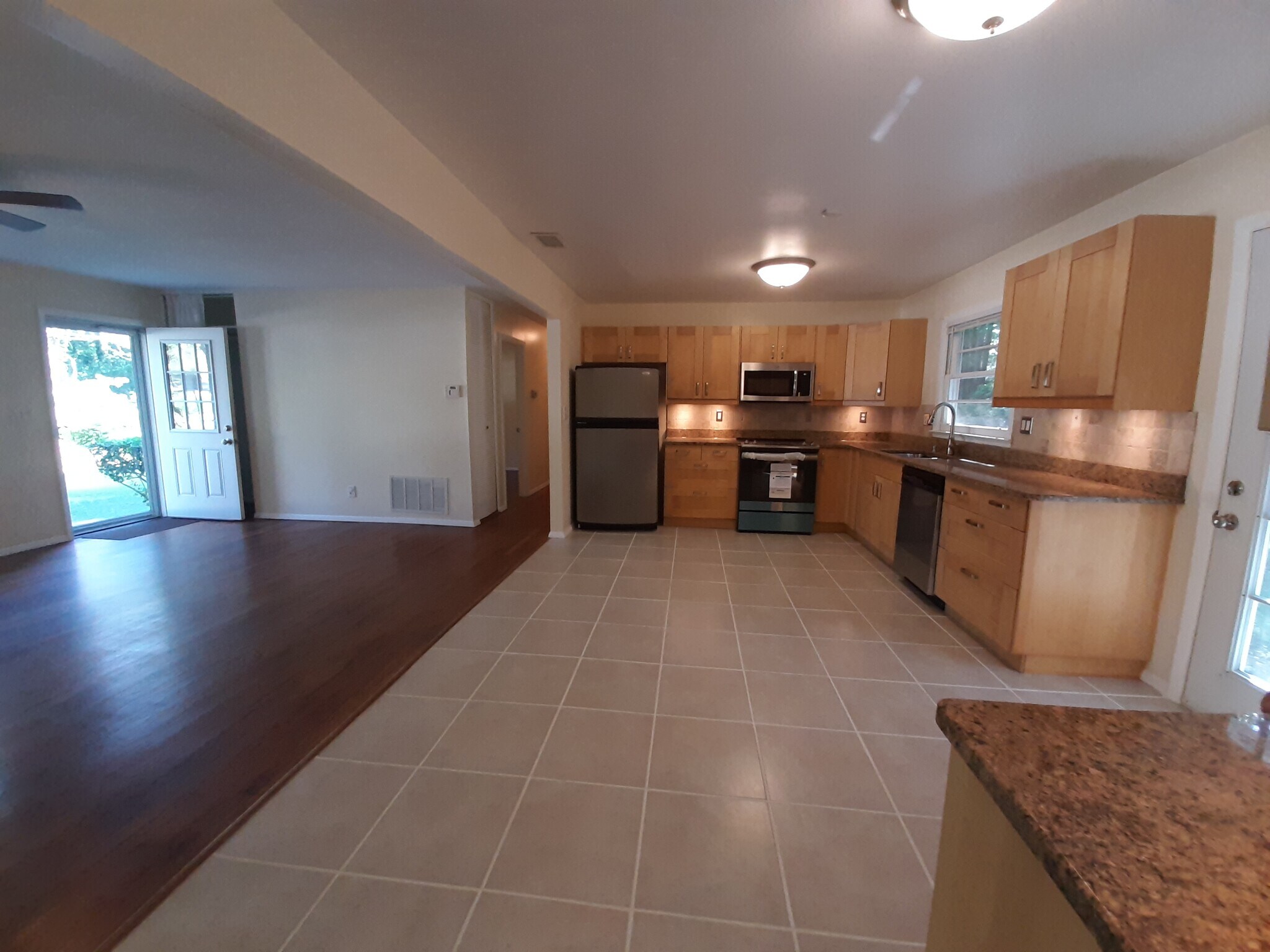 Enjoy hardwood floors and ceiling fans throughout the house. - 2955 Fantasy Ln