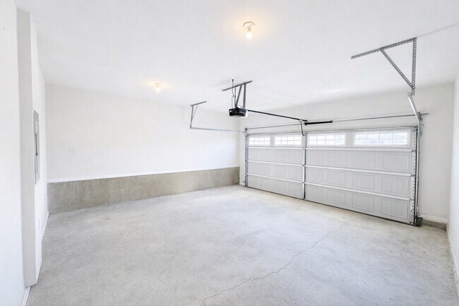 Building Photo - 3-bedroom Townhome in Buford City Schools with Quartz Kitchen, Private Suite, and Walkable Downto...