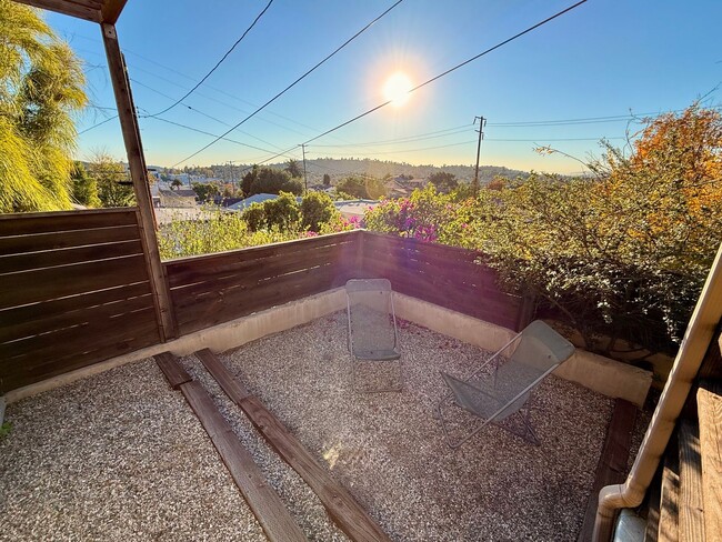 Building Photo - Hilltop Highland Park Sanctuary with Views, Private Gated Yard, In Unit Laundry, Parking & Abunda...