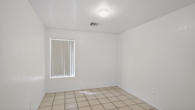 Building Photo - 7395 W San Miguel Ave