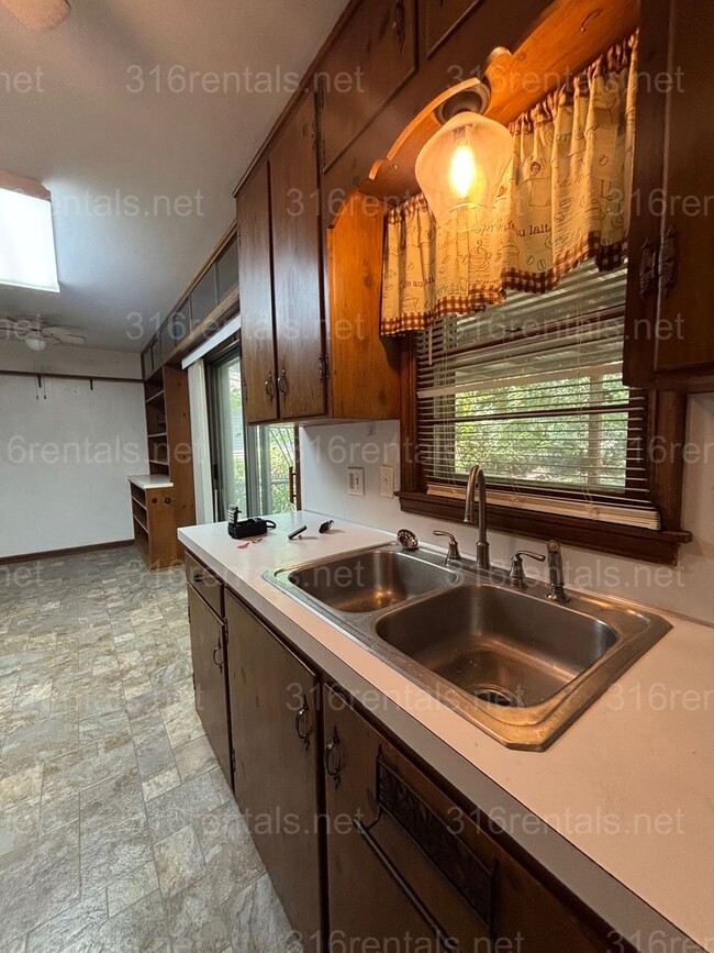 Building Photo - Three bedroom one bath house available now!