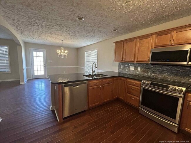 Building Photo - 5918 Lillytrotter Dr