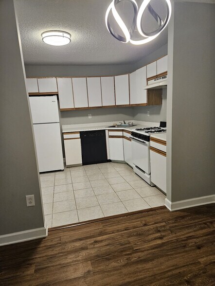 Kitchen view (cooking range replaced, shown in other pic) - 53 Juniper Way