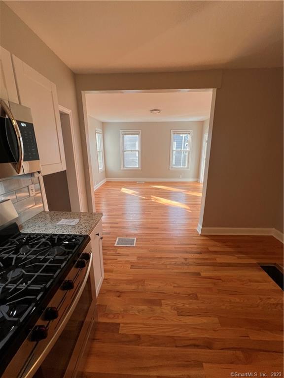 Kitchen to living area - 303 Quaker Ln S