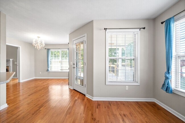 Building Photo - Pet Friendly Three Bedroom with Bonus!