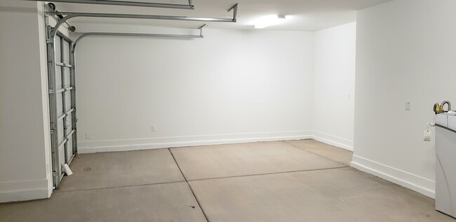 Building Photo - The 2 YEARS NEW 4 bedroom + 3 car garage r...