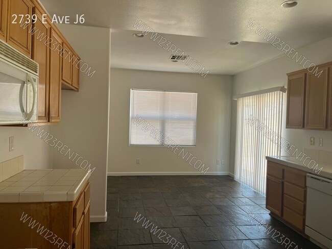Building Photo - 2739 E Ave J6