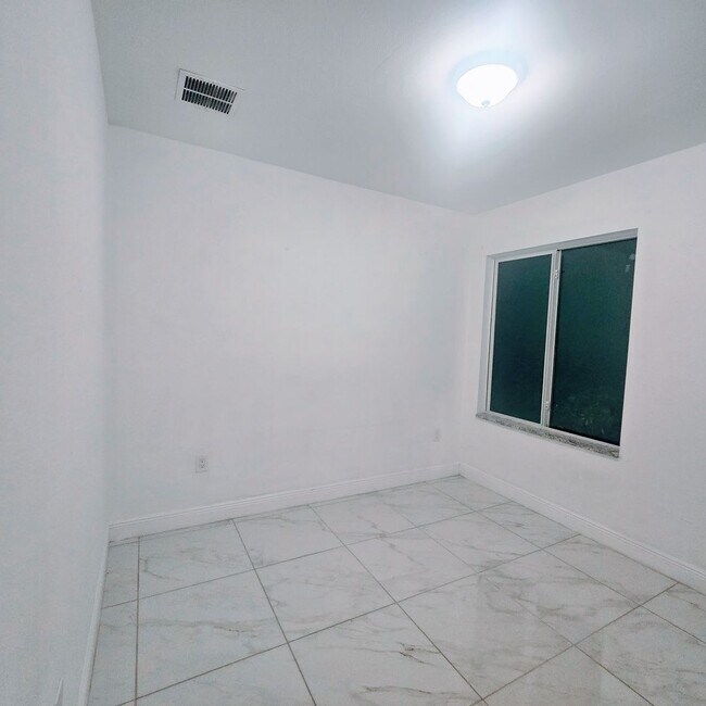 Building Photo - MUST SEE -2/2/1+OPEN DEN-DUPLEX IN GREENBR...
