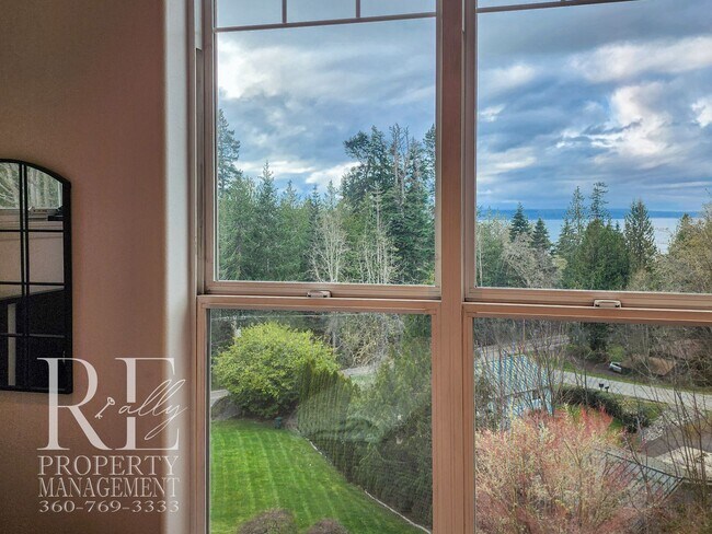 Building Photo - Light-Filled View Home with Vaulted Ceilings & Warm Wood Finishes