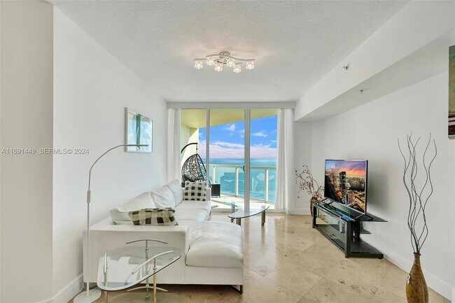 Building Photo - 16699 Collins Ave