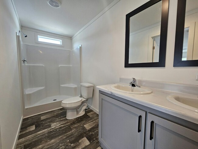 Building Photo - 6691 Hidden Oaks Dr