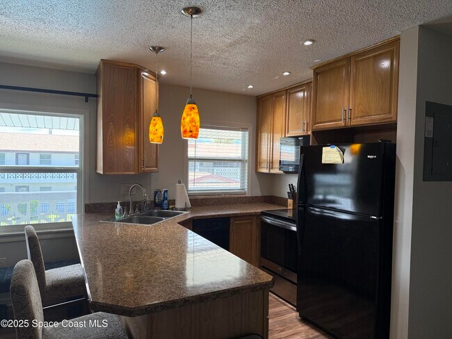 Building Photo - 5600 N Banana River Blvd