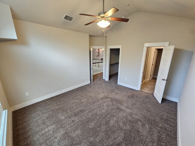 Building Photo - Experience Modern Living: Spacious 3-Bed, 3-Bath Townhome with Two Primary Bedrooms