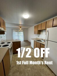 Building Photo - 1/2 Off First Full Month! Upper Floor 2 Bedroom Apartment With Washer/Dryer!