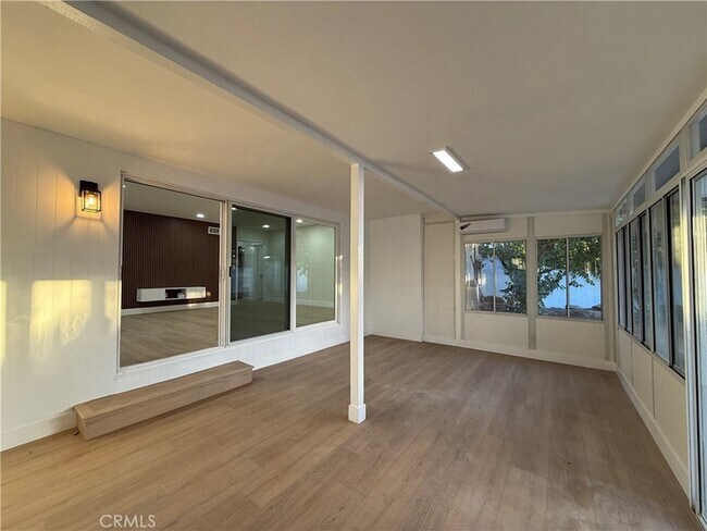 Building Photo - 9123 Woodley Ave