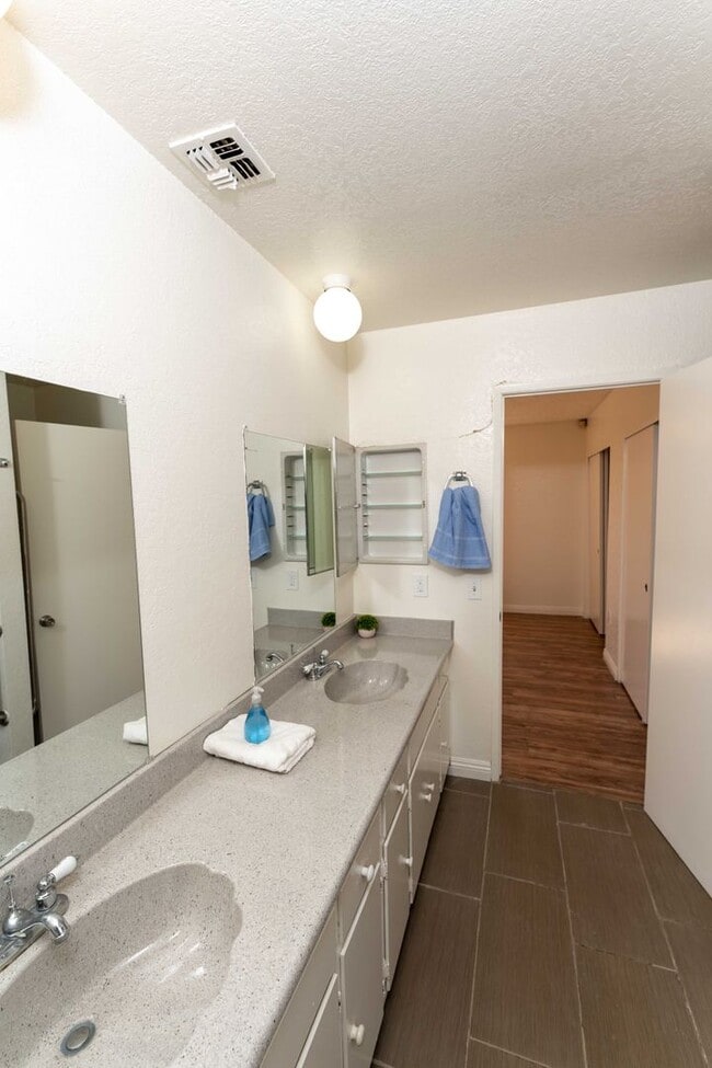 Building Photo - >>>>> TWO BEDROOM 1.5 BATHS TOWN-HOME STYL...