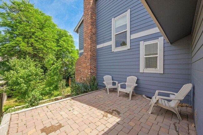 Building Photo - Spacious 4BR Home with Finished Basement, Private Yard & Community Amenities