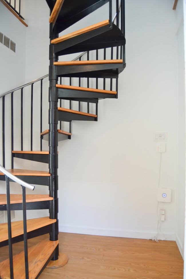 Staircase to second floor living room and kitchen - 816 N Pennock St