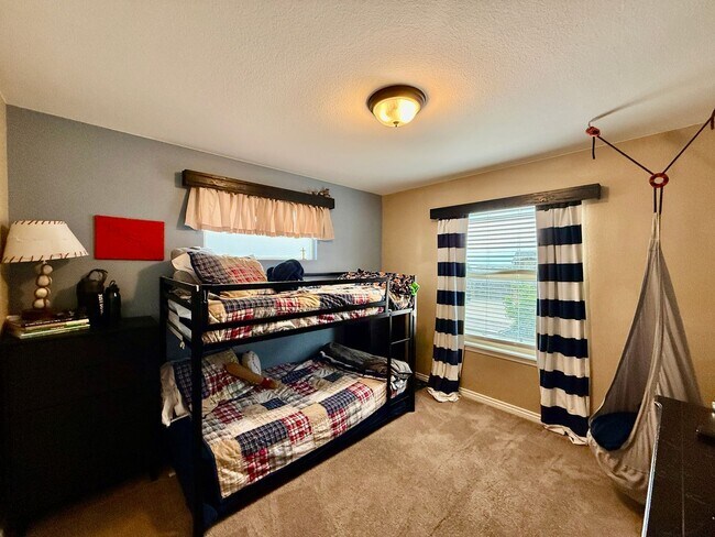 Building Photo - Spacious & Stylish 5-Bedroom Home in Wolf ...