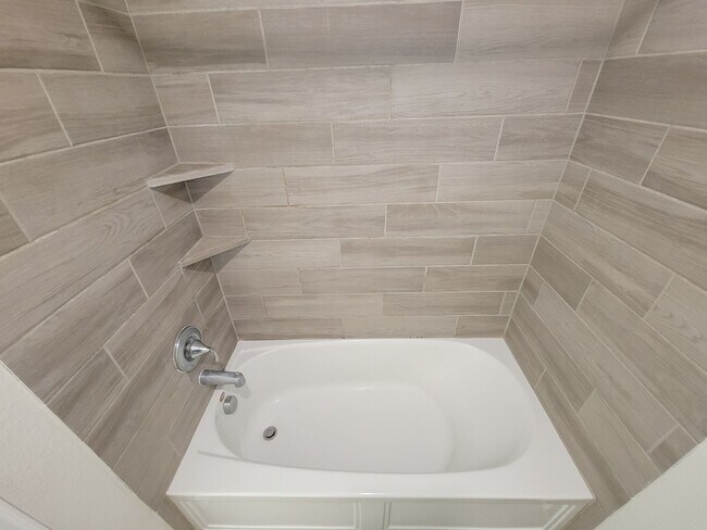 Building Photo - This thoughtfully designed home boasts 4 spacious bedrooms (2 down) and 3.5 baths, providing ampl...