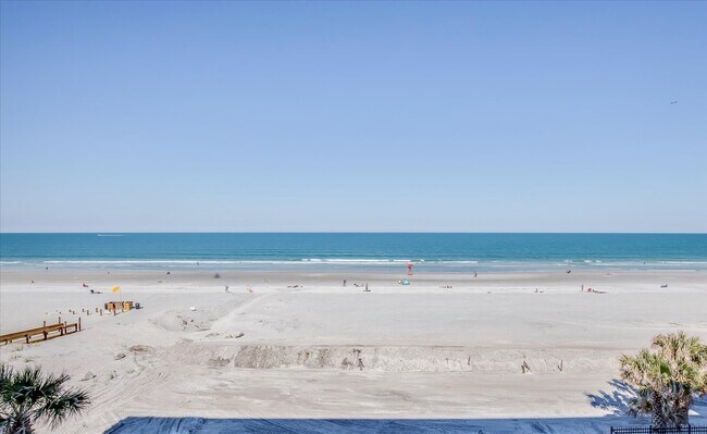 Building Photo - Beachfront Condo with Ocean Views and Acce...