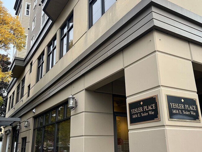Building Photo - Yesler Place | Top Floor 0BD/1BA New Floor...
