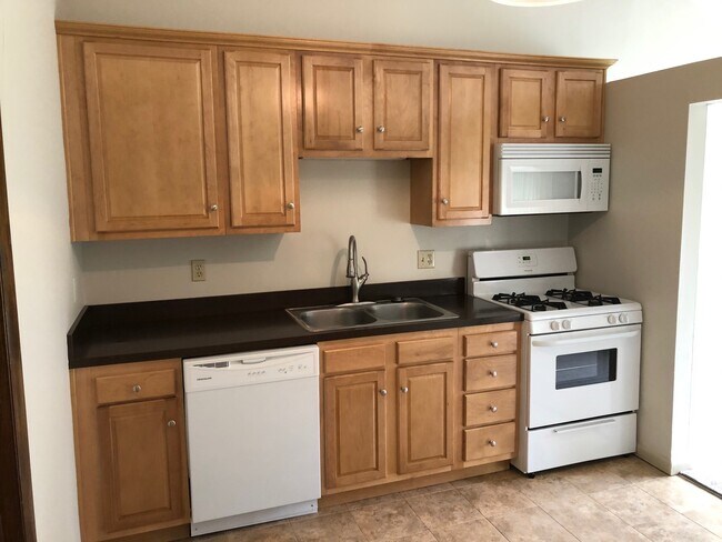 Kitchen with appliances - 8410 N Akins Rd