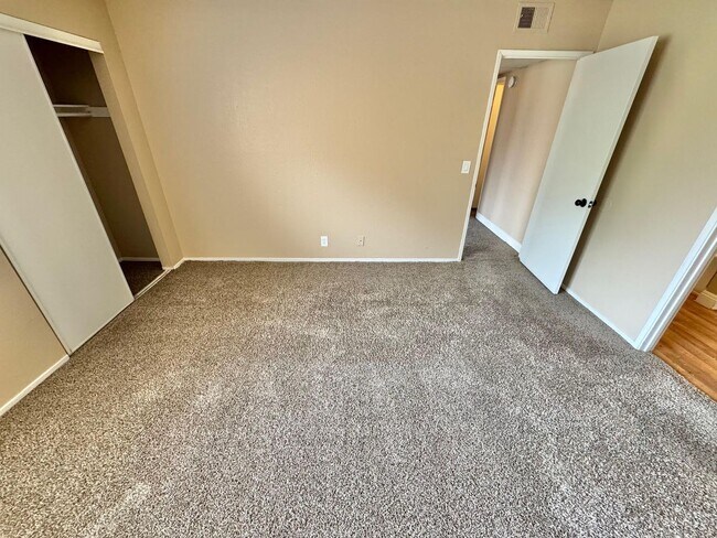 Building Photo - THIS SECOND-FLOOR DESERT SHORES CONDO OFFE...