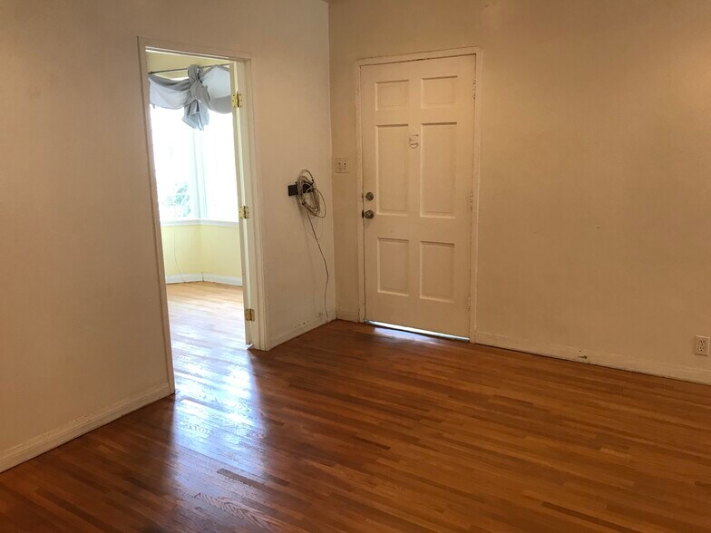 Living Room looking into Guest Bedroom - 5362 Monroe St